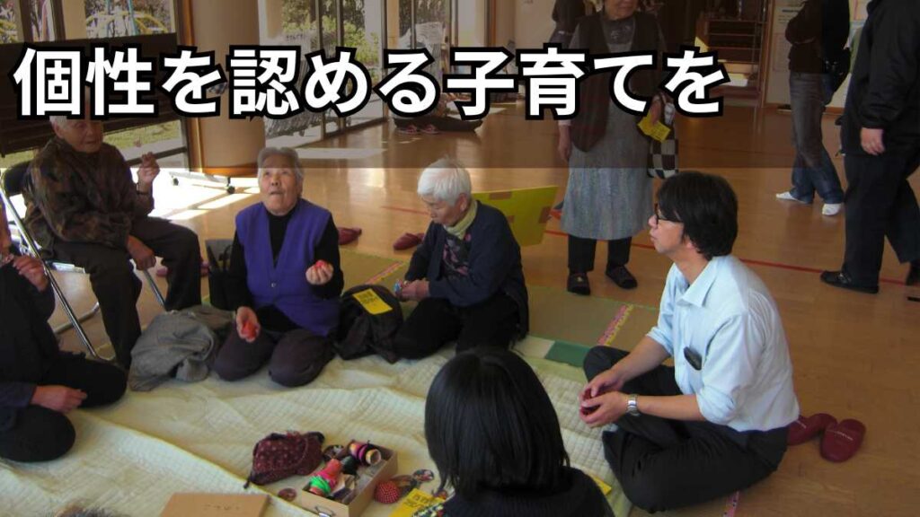 人権講演後に参加者と交流する石川達之
